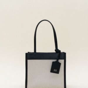 This elegant ladies' tote bag is the perfect blend of fashion and function. Designed with a spacious main compartment, it easily fits your everyday essentials such as a laptop, makeup pouch, water bottle, books, and more. Crafted from high-quality materials, it's durable enough for daily use while maintaining a sleek and stylish look. Comfortable shoulder straps ensure easy carrying, whether you're heading to work, running errands, or traveling. Multiple interior pockets help keep your items organized and accessible. With a secure zipper or magnetic closure, this versatile tote bag is both practical and chic—an everyday must-have.